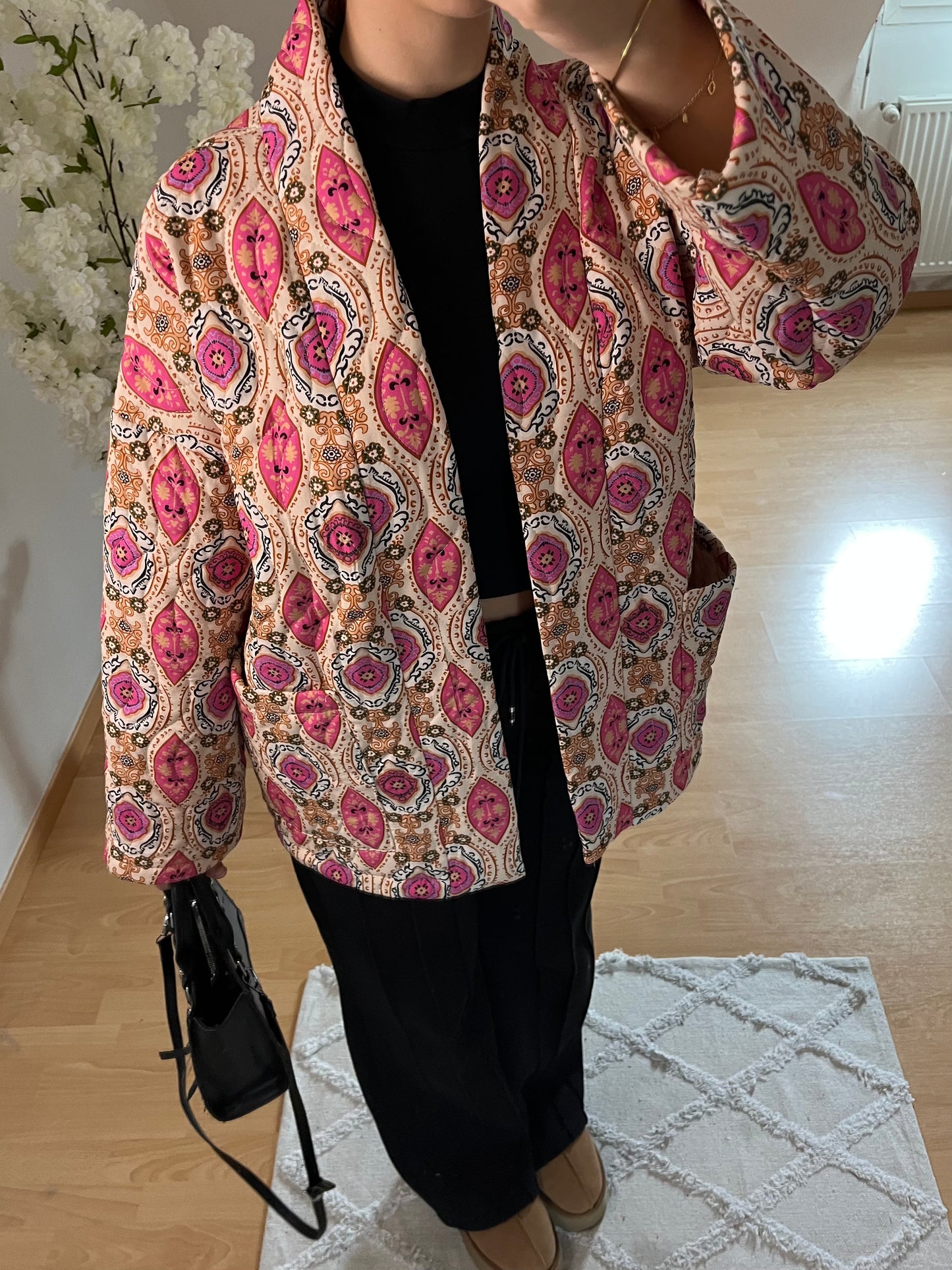 Veste matelassée à motifs rose